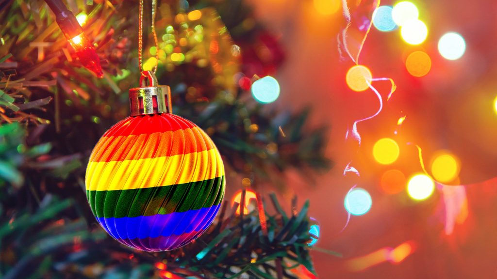 A tree with rainbow decorations