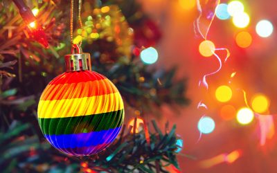A tree with rainbow decorations